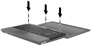 16. Wkręć śruby klawiatury. Komputer zawiera 2 lub 3 śruby do wkręcenia.