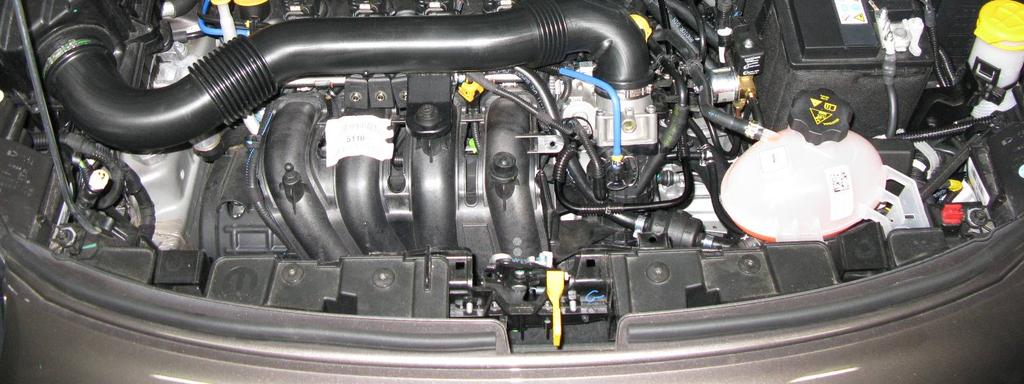Rozmieszczenie elementów układu zasilania paliwem LPG w komorze silnika 1) parownik/regulator ciśnienia (mocowany w nadkolu pojazdu)