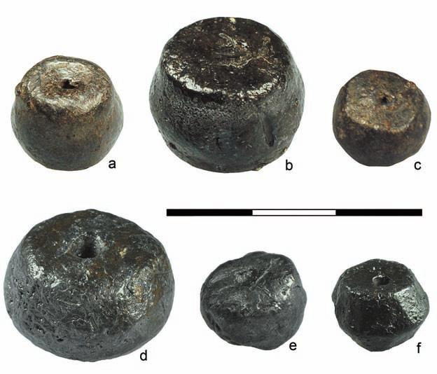 Sawicki Fig. 405. Wrocław, Nowy Targ square, excavations 2010-2012. Weights marked with a single point on each of the faces ( / ).