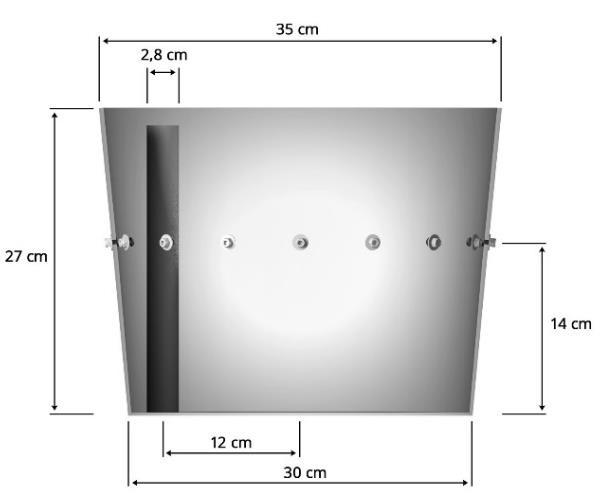 (a) (b) Rys. 3. Model fizyczny z układem elektrod EIT: a) rysunek schematyczny, b) reaktor z zanurzonymi w cieczy artefaktami Na Rys.