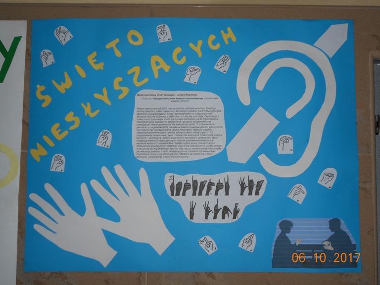 Plakat z okazji Dnia Osób Niesłyszących i Języka Migowego