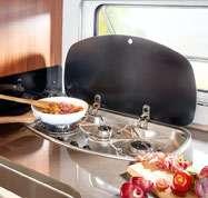 KUCHENKA Z AUTOMATYCZNYM ZAPŁONEM Na kuchence ze stali szlachetnej można gotować nawet trzy potrawy jednocześnie, dzięki przemyślanemu układowi palników