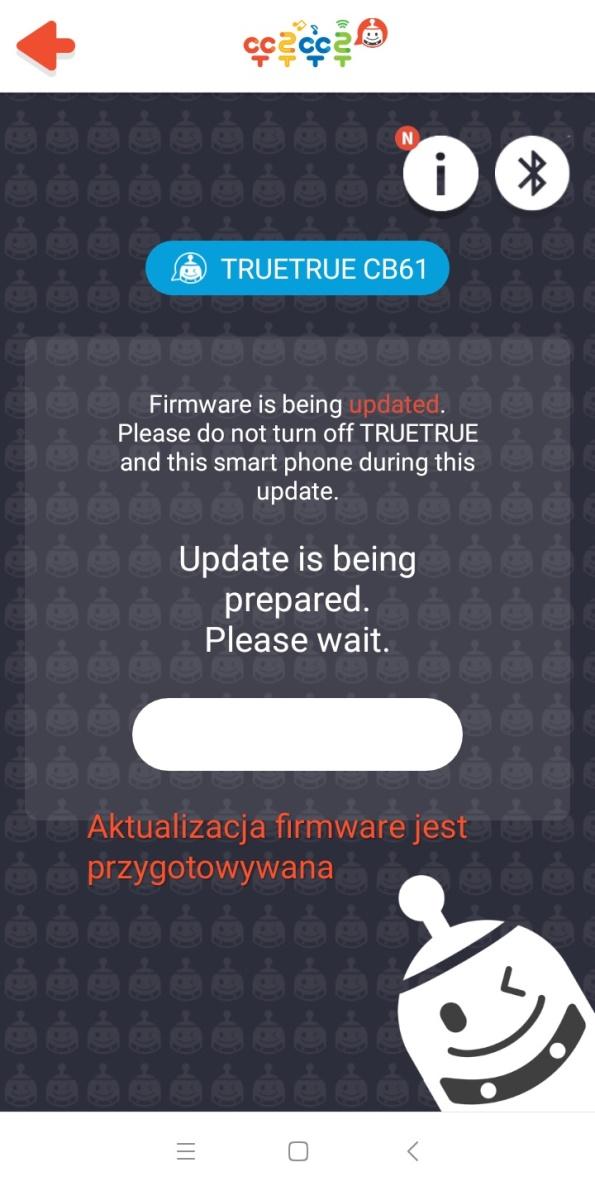 Na ekranie pojawi się informacja, że aktualizacja firmware jest w trakcie