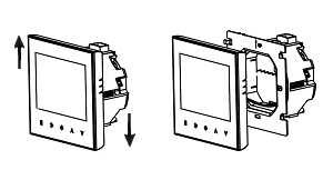 2. Rozłącz część z wyświetlaczem od metalowej ramki przesuwając wyświetlacz do góry. Obydwie części połączone są tasiemką przewodów.