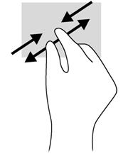 W celu powiększenia elementu umieść dwa złączone palce w strefie płytki dotykowej TouchPad i rozsuwaj je.