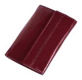 14 Skórzany portfel Skórzany portfel, ze skóry naturalnej, zapinany na zatrzask,
