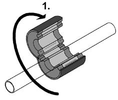 zamknąć i płaszczyzny zamków (skorupy i obejmy) ustawić równolegle Rurę ułożyć w skorupie