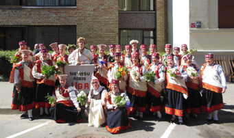 LATVIA/ŁOTWA Ryga TEIKSMA-LĪGA dyrygent / conductor: Maija Feldmane KATEGORIA B2 / CATEGORY B2 1. Andrejs Jurjāns Gods Dievam augstībā (Gloria) 2. Arr. M. Feldmane Skan balsinis rītā agri 3.