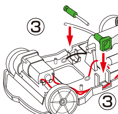 3. Umieść zawór tankowania nad otworem po lewej stronie podwozia. Upewnij się, że czerwony przewód jest umieszczony powyżej otworu tankowania.