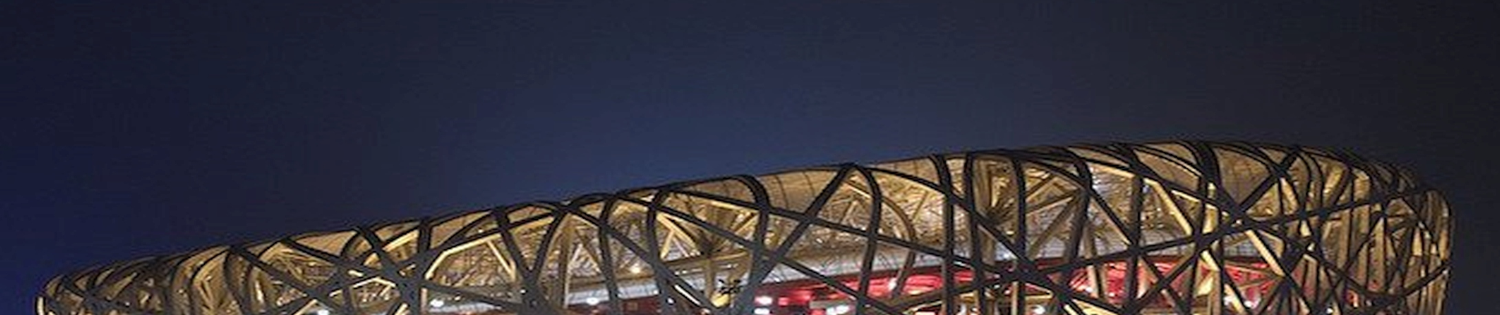 5.1. Konstrukcje łukowe w obiektach kubaturowych Za największą obecnie konstrukcję stalową uważany jest Stadion Narodowy Ptasie Gniazdo w Pekinie,