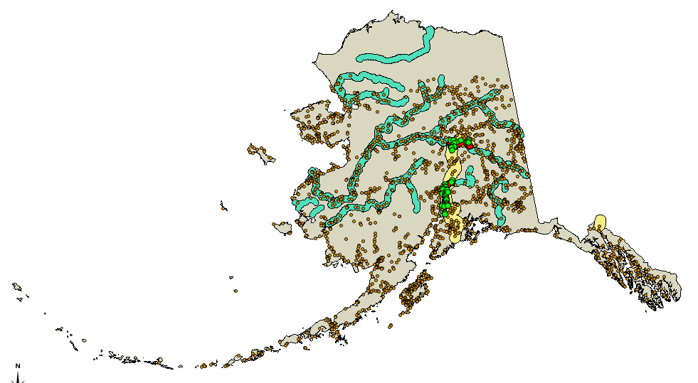 Bufory w QGIS Dane: Mapa wektorowa głównych rzek Alaski (linie niebieskie). Mapa wektorowa linii kolejowej na Alasce (linie czerwone). Mapa wektorowa budynków Alaski (pomarańczowe punkty).