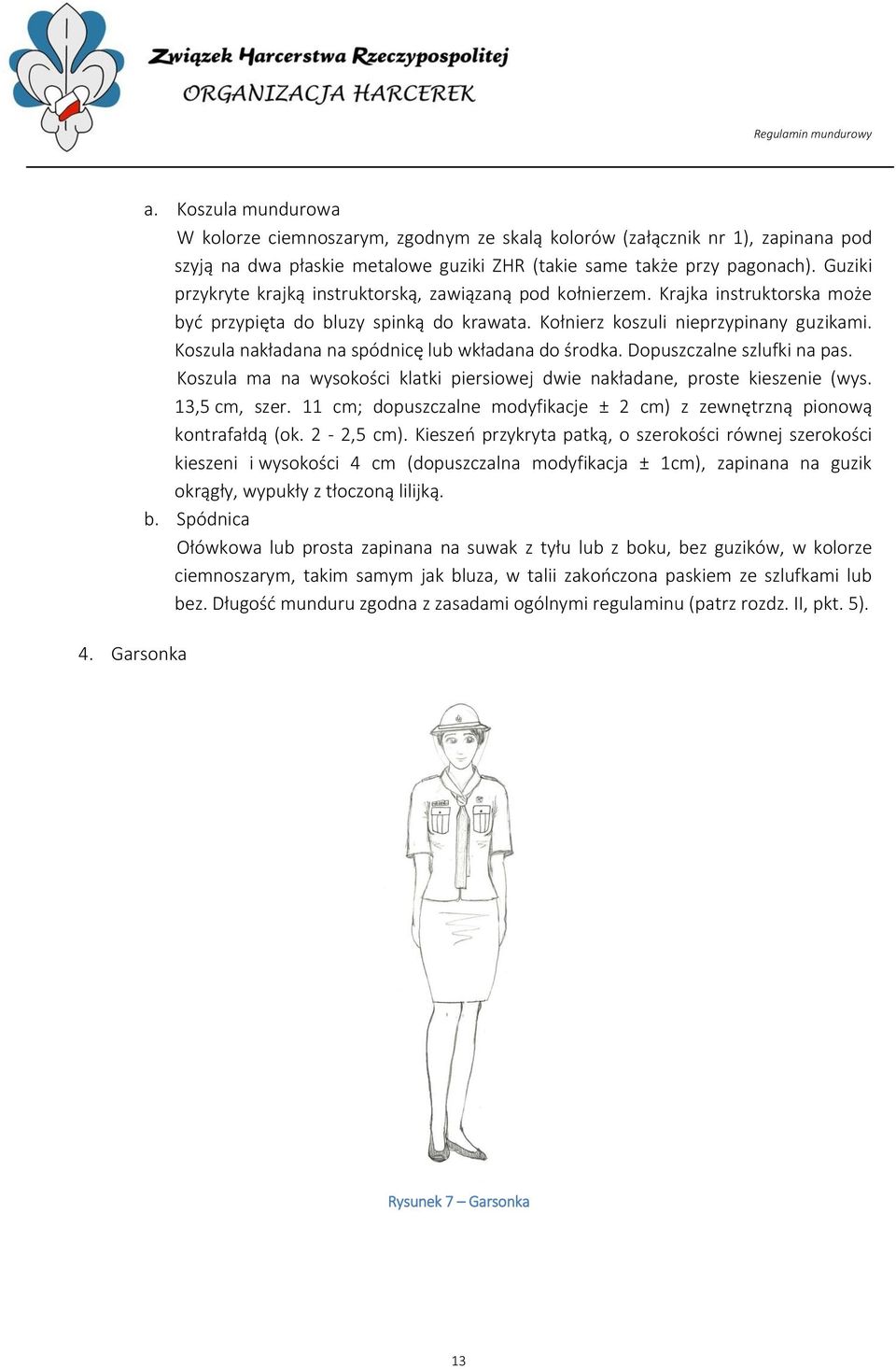 Koszula nakładana na spódnicę lub wkładana do środka. Dopuszczalne szlufki na pas. Koszula ma na wysokości klatki piersiowej dwie nakładane, proste kieszenie (wys. 13,5 cm, szer.