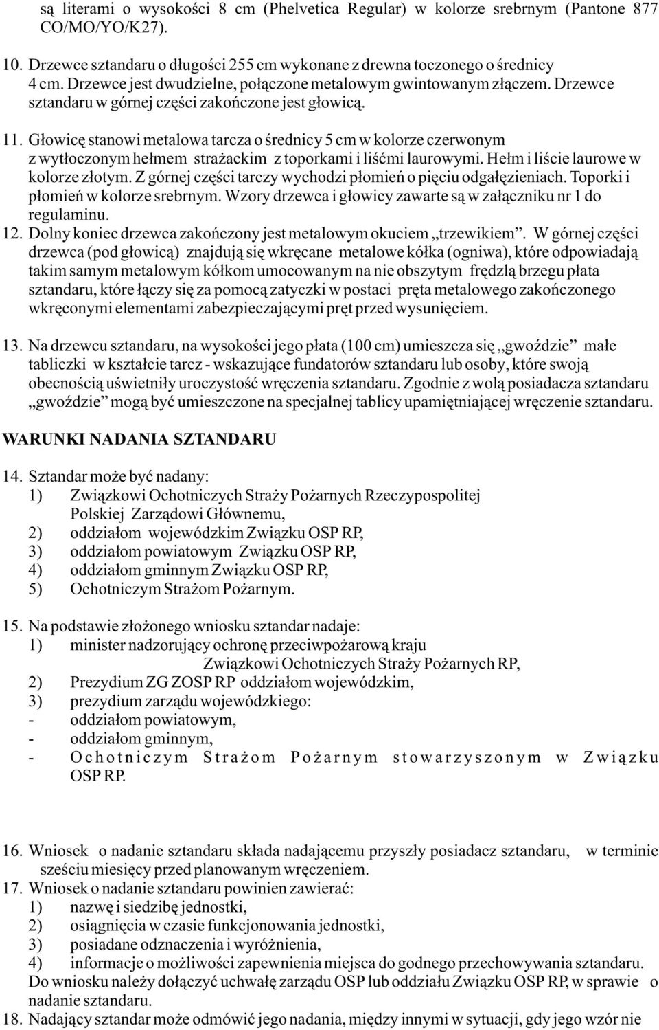 G³owicê stanowi metalowa tarcza o œrednicy 5 cm w kolorze czerwonym z wyt³oczonym he³mem stra ackim z toporkami i liœæmi laurowymi. He³m i liœcie laurowe w kolorze z³otym.