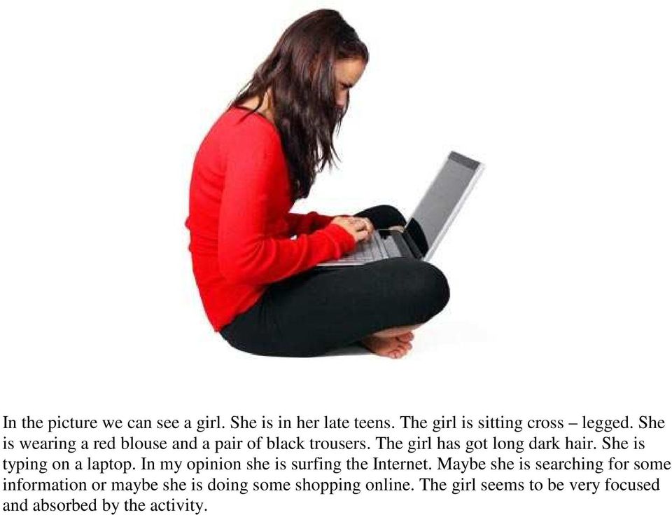 She is typing on a laptop. In my opinion she is surfing the Internet.