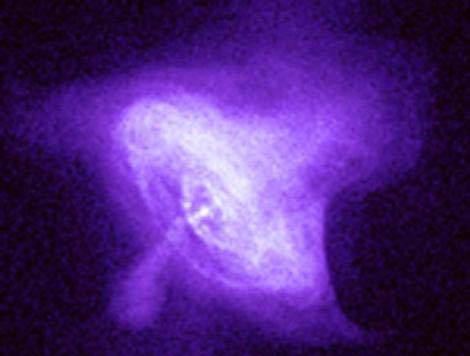 Mgławica Kraba Zdjęcie w promieniach Roentgena. W centrum tej mgławicy znajduje się ultragęsta gwiazda neutronowa, która rotuje 30 razy na sekundę.