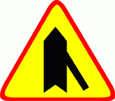 6. Kierujący pojazdem widząc ten znak jest ostrzegany o: a) drodze biegnącej ukośnie, b) skrzyżowaniu z drogą gruntową z prawej strony, c) skrzyżowaniu z jednokierunkową drogą podporządkowaną