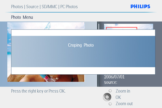 OK, aby uzyskać dostęp do menu Zdjęcie (Photo). 4 Użyj przycisku zoom + do zmniejszenia ramki przycinania.