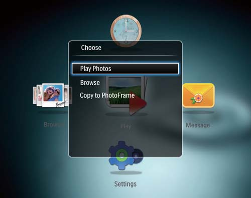 Przenoszenie plików multimedialnych Przenoszenie zdjęć za pomocą urządzenia pamięci Przestroga Podczas przenoszenia plików multimedialnych nie należy odłączać urządzenia pamięci od ramki PhotoFrame.