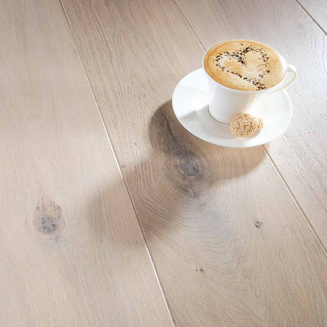 The strength and durability of the oak contrast with the delicate creamy white colour.