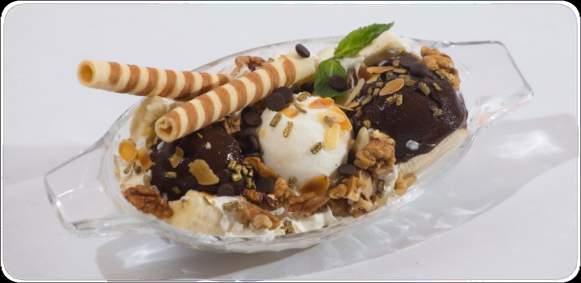 Desery lodowe Ice desserts Banana Split (banan, lody czekoladowe, lody waniliowe, bita śmietana, sos czekoladowy) 19 zł