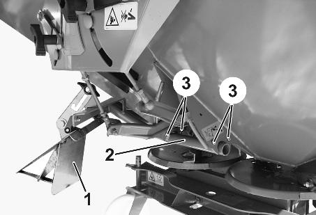 .. (1) Ekran do rozsiewu granicznego (2) Siłownik hydrauliczny do unoszenia ekranu do rozsiewu granicznego (3) Skośny mechanizm automatycznej redukcji ilości przy rozsiewie granicznym (4) Uchwyt