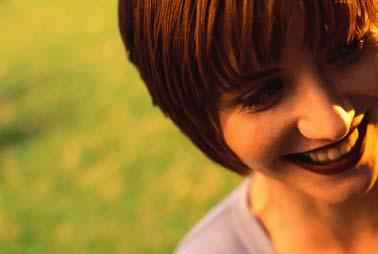 This young woman has short brown hair.