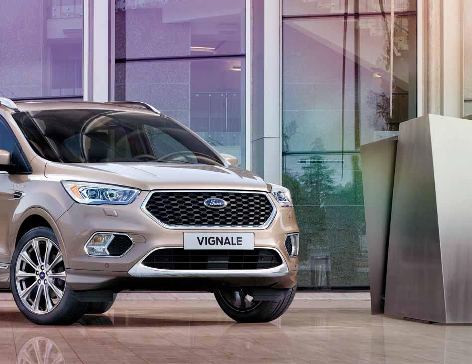 Tylko w Fordzie Vignale Ford Kuga serii Vignale wyróżnia się za sprawą wyjątkowych, 18" obręczy kół ze stopów lekkich, unikalnego wykończenia kraty wlotu powietrza oraz podwójnych końcówek układu