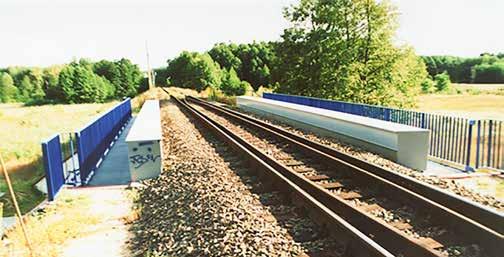 Przęsła stalowe wiaduktu kolejowego z zastosowaniem użebrowanych blachownic dwuteowych o przekroju otwartym z płytą ortotropową opartą na poprzecznicach; nowy
