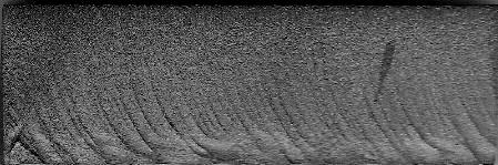 Periodical formation of waviness in CO 2 laser cutting process was not in this experiment observed.