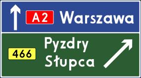 ZNAKI KIERUNKU I MIEJSCOWOŚCI E-1 "tablica przeddrogowskazowa" uprzedza o skrzyżowaniu.