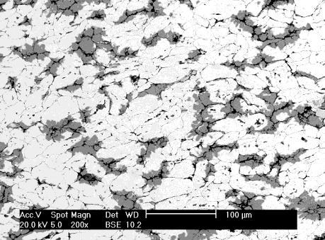 Rys. 1. Schemat stanowiska do prasowania w podwyższonej temperaturze:1- komora grzejna, 2- stempel górny, 3- stempel dolny, 4- matryca, 5- wsad, 6- ekrany cieplne, 7-podstawa. Fig. 1. Chart of device for pressing in elevated temperature:1- heater chamber, 2- upper stamp, 3- lower stamp, 4- matrix, 5- charge, 6- temperature screens, 7- base.