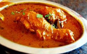 Chicken Kadai Chicken cooked in onion-garlic sauce with capsicum Kurczak w sosie cebulowo -