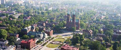 Widok na miasto z kościołem Matki Bożej Pocieszenia, fot. Urząd Miasta Żyrardowa Jasna Fimowy Żyradów 12 ŻYRARDÓW ARCHITEKTONICZNA PERŁA St.