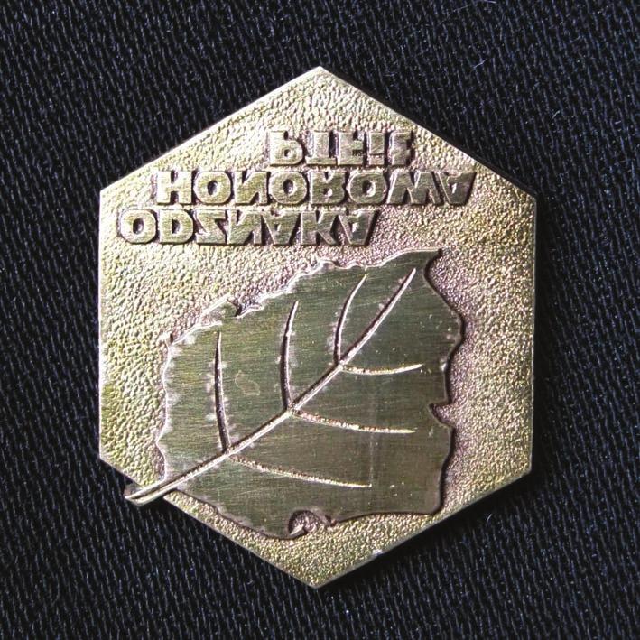 52 Reports Phot. 2. Honorary badge of The Polish Phytopathological Society (Odznaka Honorowa PTFit) (photo by M.