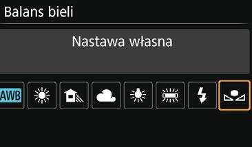 2 3 4 B: Dostosowanie do źródła światłak Wybierz pozycję [Ręczny WB (wg wzorca bieli)]. Na karcie [z2] wybierz pozycję [Ręczny WB (wg wzorca bieli)], a następnie naciśnij przycisk <0>.