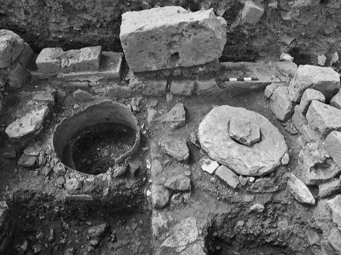 Metallurgical furnace installed in the latrine (r 49) (Photo Polish Archaeological