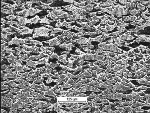 Optical microscopic images of the micropitted area: a) S1-miner oil, b) S3- miner oil a) b) Rys. 9.