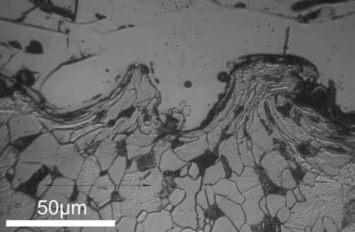 15. Cross-section of surface spraying by A wire Rys. 18. Przekrój poprzeczny warstwy natryskiwanej drutem B osadzenie w podłożu stalowym Fig. 18. Cross section a coating spraying by wire B deposit on substrate in the form of steel Rys.