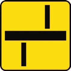 Tabliczki: a) T-6c, b) T-6d Znak A-8 Skrzyżowanie o ruchu okrężnym ostrzega o skrzyżowaniu, na którym ruch odbywa się dookoła wyspy lub placu w kierunku wskazanym na znaku.