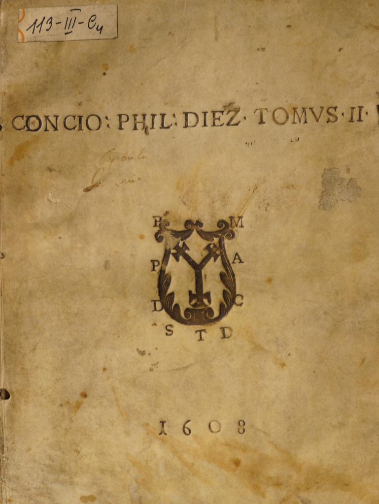 Przecława Mojeckiego Na przedniej oprawie książki Super Evangelia wokół herbu w skrócie zapisana informacja o właścicielu