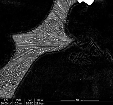 MC carbide microstructure and electron diffraction (from the region indicated by the arrow).