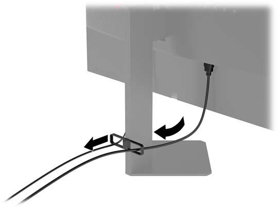 5. Przeprowadź kable przez zacisk umożliwiający ich układanie (znajduje się z tyłu podstawy monitora).