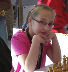 Kilkakrotną mistrzynią Polski w szachach klasycznych,