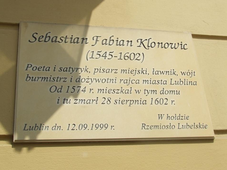 Kamienica, Rynek 2 3. a) Ustalcie kim była postać związana z tą kamienicą.