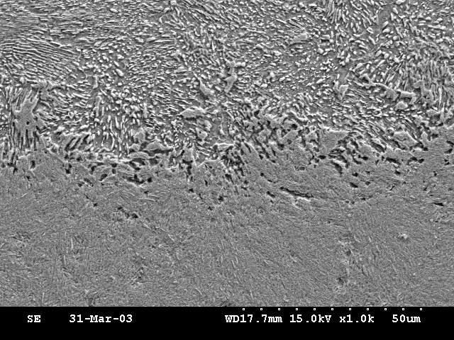 perlitycznej Obszar po naświetlaniu wiązką laserową 50µm a) fragment obszaru