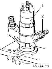 Adapter powrotu dla wtryskiwaczy z gwintem wewnętrznym Rys. 33: Adpter dla złącza z gwintem wewnętrznym 1 Wtryskiwacz 2 Adapter powrotu 3.2.4 Mocowanie komory wtryskowej Rys. 34: Komora wtryskowa 1.