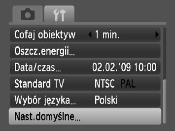Przywracanie ustawień domyślnych aparatu W przypadku zmiany ustawienia przez pomyłkę można przywrócić ustawienia domyślne aparatu. Wyświetl menu. Naciśnij przycisk n. Wybierz opcję [Nast.domyślne].