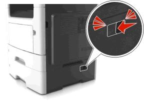 Przegląd drukarki 218 Przenoszenie drukarki UWAGA NIEBEZPIECZEŃSTWO USZKODZENIA CIAŁA: Waga drukarki jest większa niż 18 kg i do jej bezpiecznego przeniesienia potrzeba co najmniej dwóch
