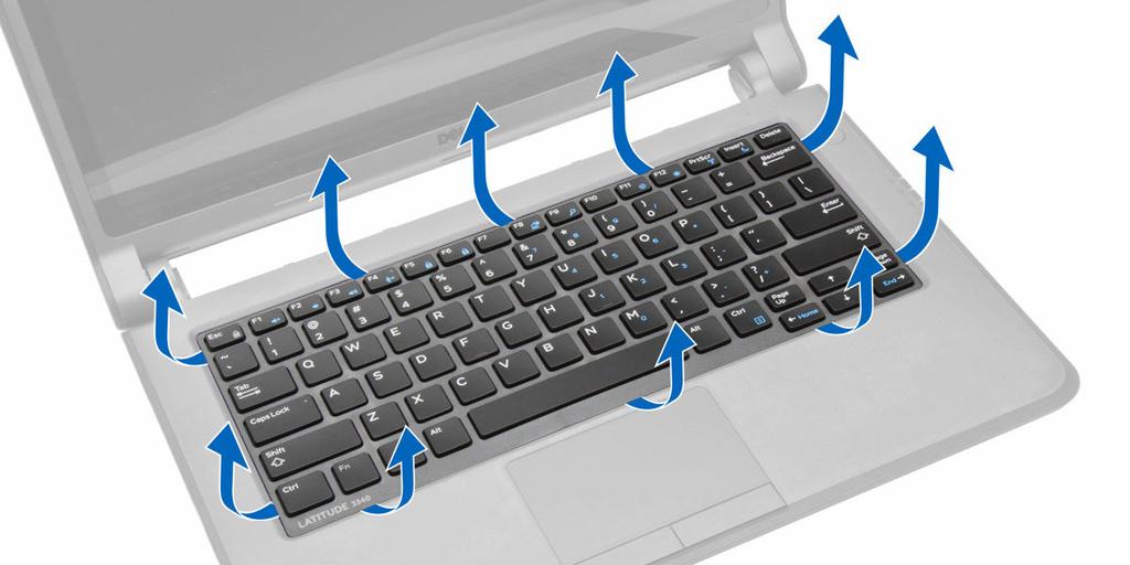 3. Wyjmij oprawę klawiatury z komputera. Instalowanie oprawy klawiatury 1. Umieść oprawę klawiatury na miejscu. 2. Dociśnij brzegi oprawy klawiatury, aby ją osadzić. 3.
