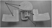 Rys. 4. Rozformowanie prototypu: 1) elementy składowe formy silikonowej, 2) prototyp koła zębatego Wybrane zagadnienia niezbędne do kolokwium: 1.